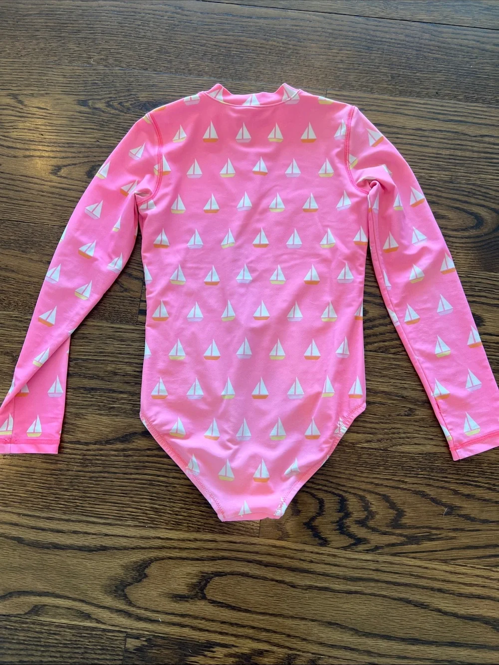 Primary Pink Long Sleeve Sailboat Rashguard bathing suit.